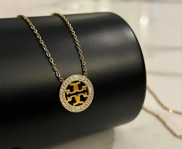 Golden Emblem Pendant